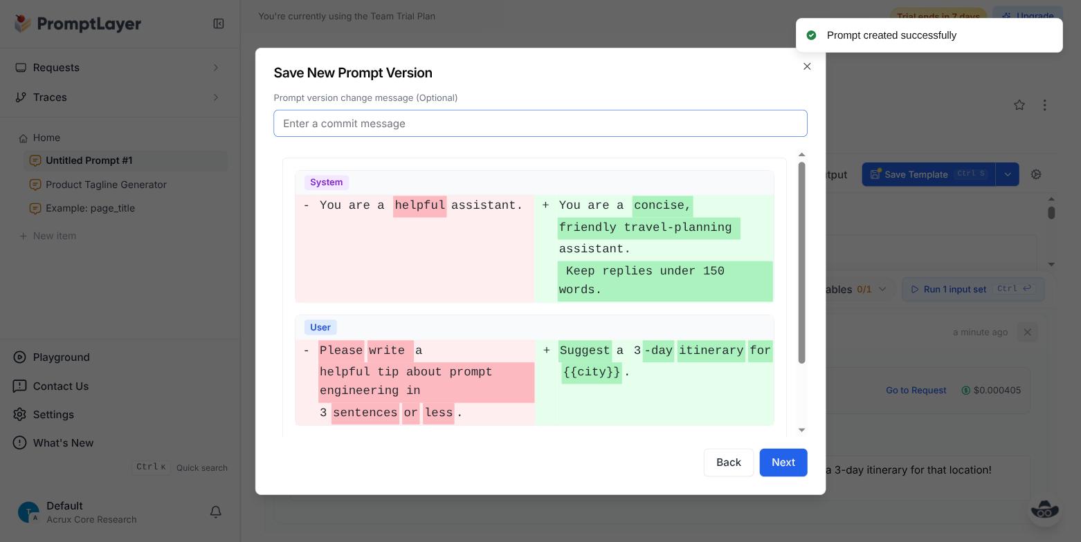 PromptLayer's save-new-version dialog showing a colored diff of the system and user message changes, with a commit message field